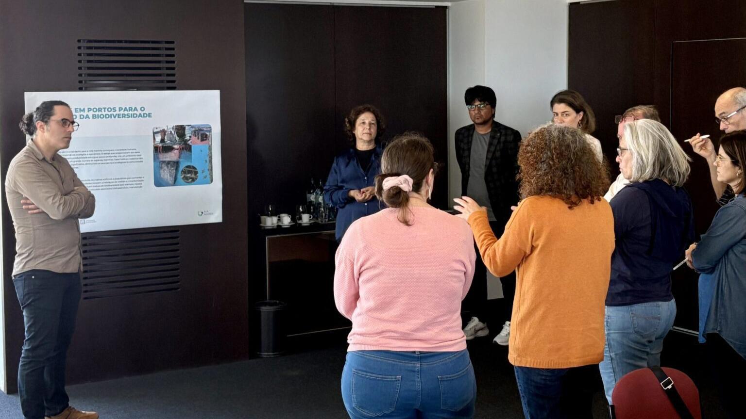 Community stakeholders in Portugal reviewing artificial marina nurseries to restore coastal biodiversity and fisheries.