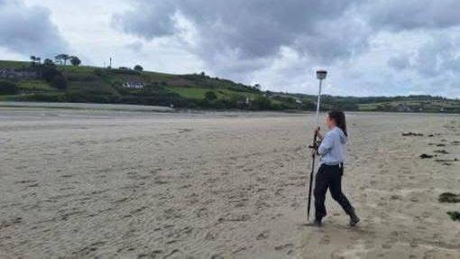 Cork County Ireland coastal researchers analyzing DGPS, drone and citizen science data to forecast shoreline change and storm impacts.